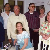 RPCV group and friends on porch - Connie, Shirley Hamilton, Earl, Wolfgang, Jon & Sallyl, Henry, Joanne, Nancylou